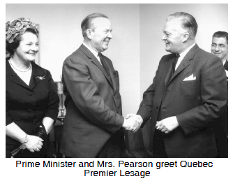 Prime Minister and Mrs. Pearson greet Premier Lesage
