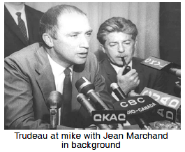 Trudeau at mike with Jean Marchand